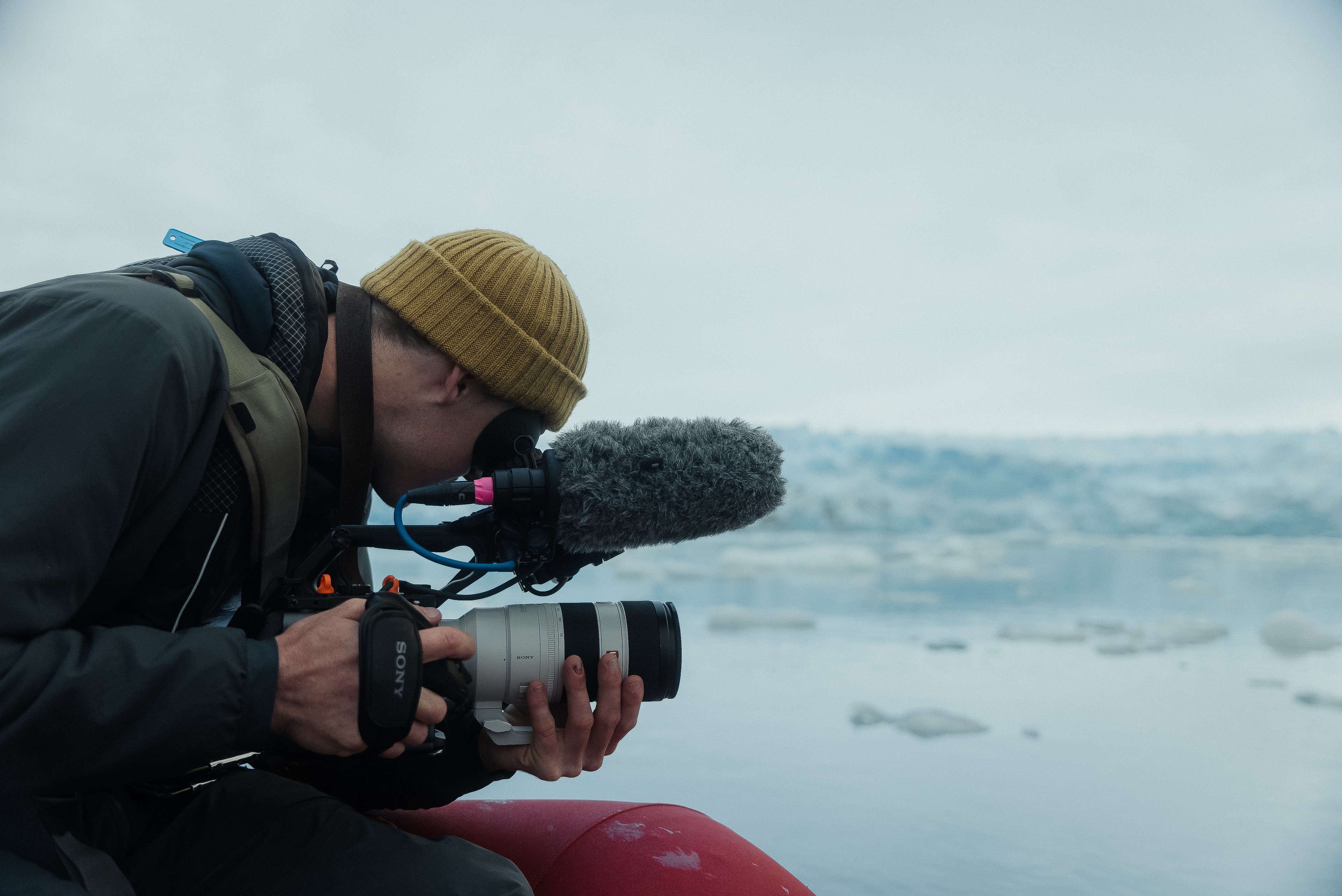 Person taking video footage on the water